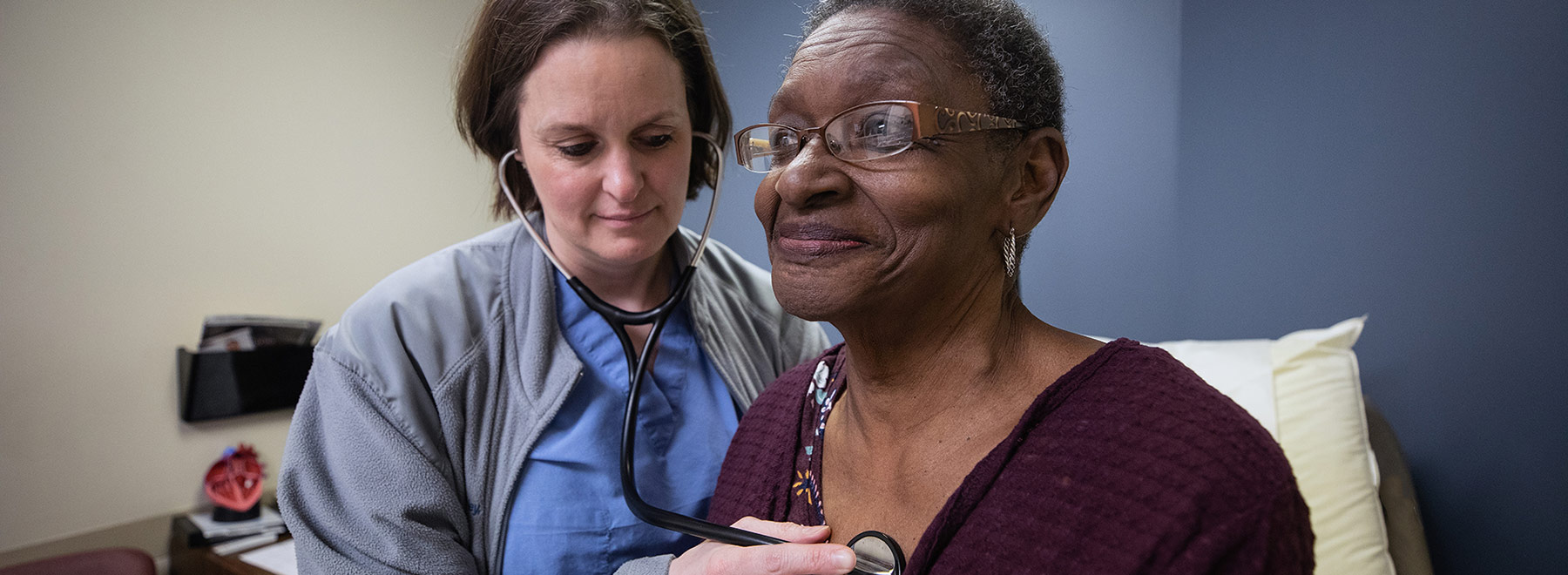 Cardiologist examining a Mitraclip patient Cardiologist examining a Mitraclip patient